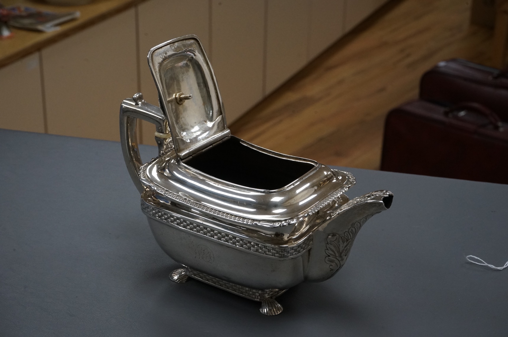 A George III silver oblong teapot by Daniel Pontifex, London, 1809, decorated with 'basket weave' bands, gross weight 26,2oz., CITES Submission reference, 712SNDFP